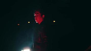 expressions of Satanists performing rituals in black clothes in the dark video