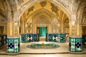 Kashan, Iran, 2022 - Interior and art in hot bathing hall at Sultan Amir Ahmad Bathhouse. Persian public bathhouse. Kashan is a popular tourist destination photo