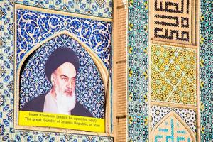 Great founder of Islamic republic of Iran. Portrait in isfahan square. Tilework photo
