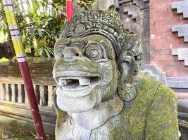 Balinese garden gnome used as decorations on the balinese parks and gardens photo