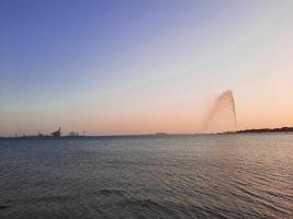 Beautiful evening and colorful sunset at Jeddah corniche. photo