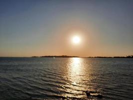 Beautiful evening and colorful sunset at Jeddah corniche. photo