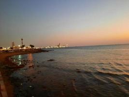 Beautiful evening and colorful sunset at Jeddah corniche. photo