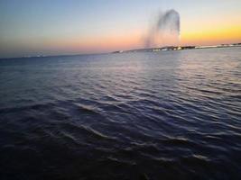 Beautiful evening and colorful sunset at Jeddah corniche. photo