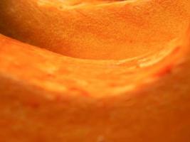 Yellow flesh of a raw pumpkin close up photo