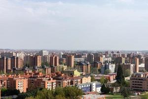 skyline view of a medium-sized city on a sunny day photo