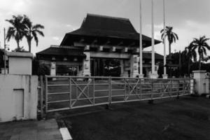 a traditional indonesia hall in the center of the city that is used as a traditional event photo