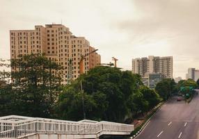 modern office building in the city with blue sky and Highway cityscape photo