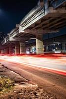 motion photography in under bridge at night Bekasi Indonesia photo