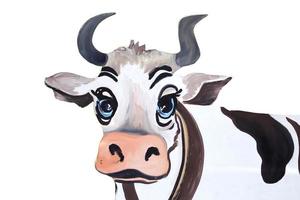 Drawing of a cartoon cow on a white background. photo