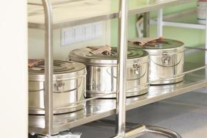 Metal containers with sterile material in a surgical operating room. photo