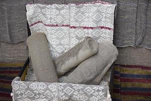 Rough self-woven fabric with ethnic geometric Slavic patterns. photo