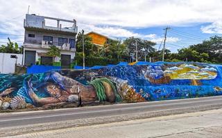 Puerto Escondido Oaxaca Mexico 2022 Painted rock with art graffiti and painting Puerto Escondido Mexico. photo