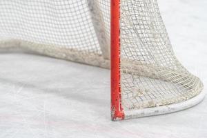 detail of a hockey goal on the ice photo