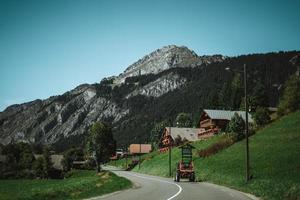 Wooden hut in the alps with mountains in the background Panorama photo