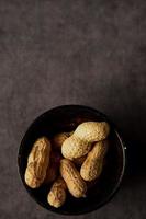 Pistachios on a gray background minimalistic style photo