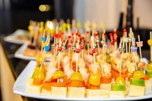 buffet table with snacks for guests photo