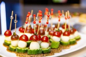 buffet table with snacks for guests photo