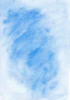 Watercolor light blue background liquid texture. Aquarelle abstract cerulean backdrop. Stains on paper. photo