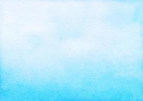 Watercolor light blue ombre background hand painted. Aquarelle pastel blue gradient texture. photo