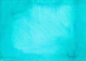 Watercolor light turquoise background texture with space for text. Stains on paper photo