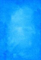 Watercolor blue background painting texture with space for text. Stains on paper. photo