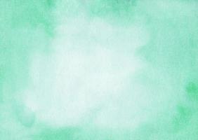 Watercolor mint color and white background texture with space for text. Light emerald gradient backdrop. photo