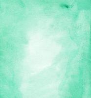 Watercolor light sea green background texture. Aquarelle mint color backdrop with space for text. photo