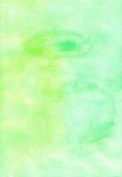 Watercolor light yellow and green background texture. Aquarelle lime gradient backdrop. photo