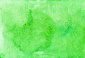 Watercolor bright green background texture. Aquarelle greenery color trend backdrop. Stains on paper. photo