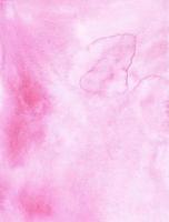 Watercolor pastel soft pink gradient  background painting. Watercolour light fuchsia liquid backdrop. Stains on paper. photo