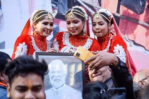 New Delhi, India - January 16 2023 - Thousands of people collected during Prime Minister Narendra Modi BJP road show, people during PM Modi big election rally in the capital photo