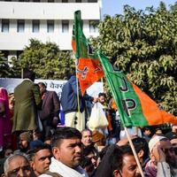 New Delhi, India - January 16 2023 - Thousands of people collected during Prime Minister Narendra Modi BJP road show, people during PM Modi big election rally in the capital photo