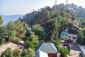 Early morning view of Modern rooftop restaurant at Kasauli, Himachal Pradesh in India, View of mountain hills from open air restaurant in Kasauli, Kasauli Rooftop restaurant photo