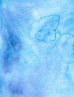 Watercolor blue ombre background texture. Watercolour deep blue gradient. Stains on paper. photo