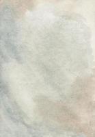 Watercolor light brown-gray background texture. Neutral beige backdrop. Stains on paper photo