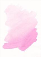 Watercolor light pink background stains on paper. Pastel pink texture overlay. Brush strokes. photo