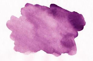 Watercolor deep purple spot on white background with space for text. Stains on paper. photo