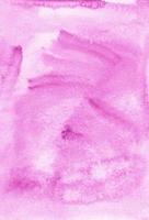 Watercolor pastel pink background painting. Watercolour light rose color liquid backdrop. Stains on paper. photo