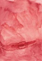 Watercolor red liquid background. Elegant dark coral backdrop texture. Stains on paper. photo