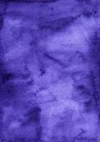 Watercolor deep blue background painting texture. Vintage royal purple color backdrop. Stains on paper. photo