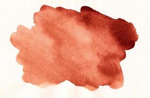 Watercolor red spot on white background texture. Rusty color stains on paper. photo