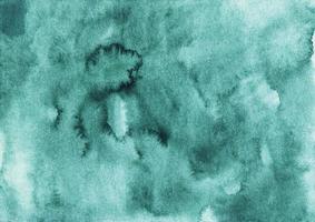 Watercolor liquid sea green background texture. Aquarelle abstract emerald backdrop. Stains on paper. photo