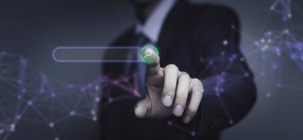 Businessman are touching the virtual screen on search engine optimization for find data on networking, SEO, Searching Browsing Internet Data Information Networking Concept. photo