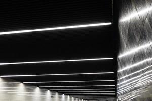 abstract illumination on black granite ceiling photo