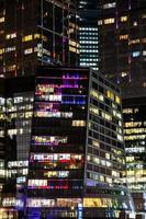 glass towers in Moscow city district in night photo