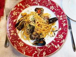 top view of spaghetti with mussels and clams photo