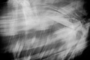 Black and white abstract background of line intersections, scuffs and light. photo