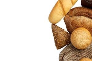 Composition with loafs of bread isolated on white background photo