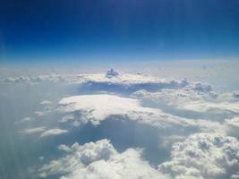 Blue sky with clouds background photo